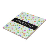 Farbenfrohe Blume, hellgrüner Hintergrund, schwarz Fliese (Seite)