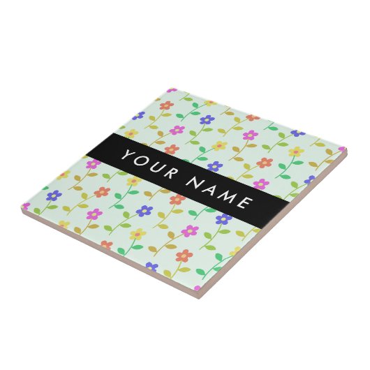 Farbenfrohe Blume, hellgrüner Hintergrund, schwarz Fliese (Seite)