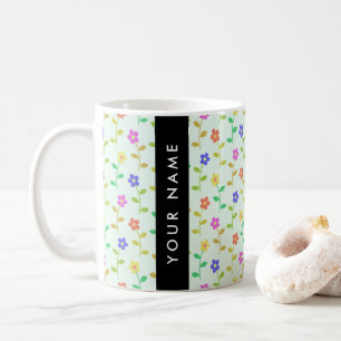 Farbenfrohe Blume, hellgrüner Hintergrund, schwarz Kaffeetasse