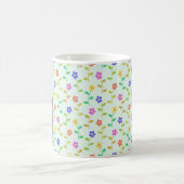 Farbenfrohe Blume, hellgrüner Hintergrund, schwarz Kaffeetasse (Mittel)