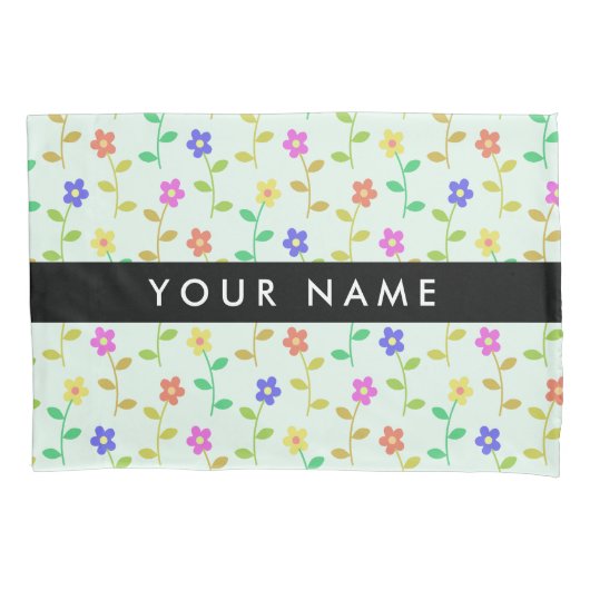 Farbenfrohe Blume, hellgrüner Hintergrund, schwarz Kissenbezug (Vorderseite)