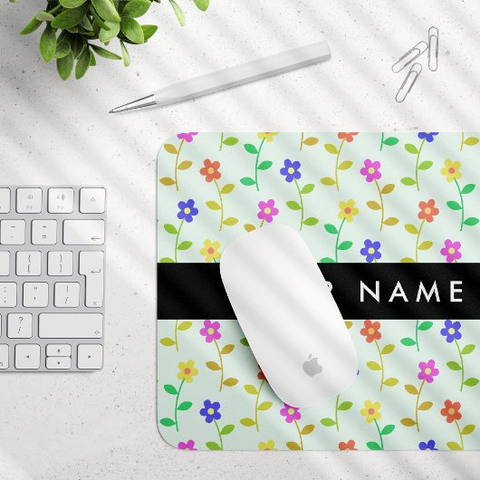 Farbenfrohe Blume, hellgrüner Hintergrund, schwarz Mousepad