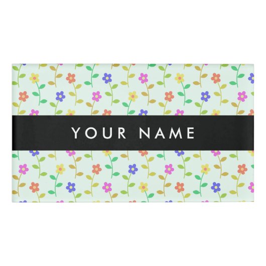 Farbenfrohe Blume, hellgrüner Hintergrund, schwarz Namenschild (Vorderseite)