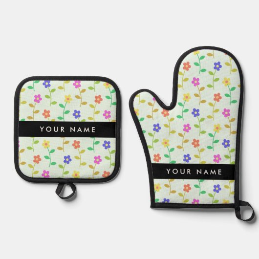 Farbenfrohe Blume, hellgrüner Hintergrund, schwarz Ofenhandschuh & Topflappen-Set (Vorderseite)