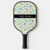 Farbenfrohe Blume, hellgrüner Hintergrund, schwarz Pickleball Schläger (Rückseite)
