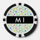 Farbenfrohe Blume, hellgrüner Hintergrund, schwarz Pokerchips (Vorderseite)