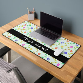 Farbenfrohe Blume, hellgrüner Hintergrund, schwarz Schreibtischunterlage