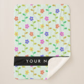 Farbenfrohe Blume, hellgrüner Hintergrund, schwarz Sherpadecke (Vorderseite)