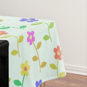Farbenfrohe Blume, hellgrüner Hintergrund, schwarz Tischdecke (Beispiel)