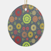 Farbenfrohe Blume in warmen Farbtönen Keramik Ornament (Links)