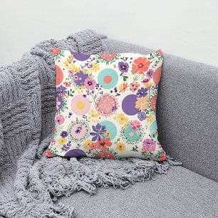 Farbenfrohe Blumenmuster und geometrisches Vintage Kissen