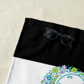 Farbenfrohe Blütenlephäre und schwarz-weiße Streif Strandtuch (Beispiel)