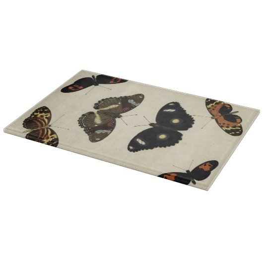 Farbenfrohe Butterfly-Medley auf Creme Background Schneidebrett (Ecke)