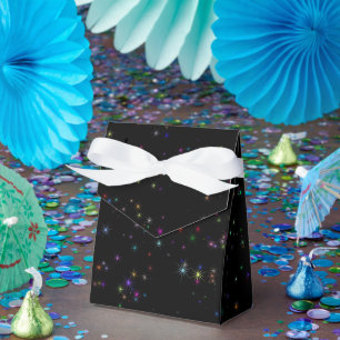 Farbenfrohe funkelnde Sterne im dunkelschwarzen De Geschenkschachtel