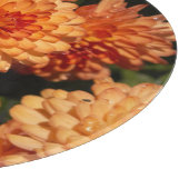 Farbenfrohe gelbe Blumen, gemildertes Glas Schneidebrett (Ecke)