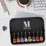 Farbenfrohe Gitarrenmonogramm Laptopschutzhülle<br><div class="desc">Elektrische, akustische und semiakustische Gitarre funky psychedelic farbige Illustrationen komplett mit personalisierter Monogramm und Namensvorlage. Jeder Gitarrist oder Musiker wird Ihnen sagen, dass Sie nie zu vielen Gitarren haben können. Dieses bunte Gitarrendesign feiert die Energie und Vielfalt dieses wunderbaren Musikinstruments. Das perfekte Geschenk für Gitarristen, Musiker und Musikliebhaber. Psychedelische Gitarre...</div>