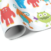 Farbenfrohe glückliche Monster mit Kid Name Patter Geschenkpapier (Rolleneckpunkt)