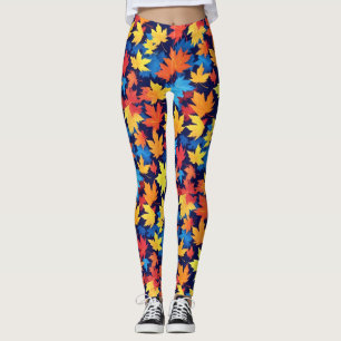 Farbenfrohe Herbstüberreste im dunkelblauen Hinter Leggings