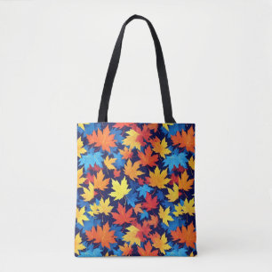 Farbenfrohe Herbstüberreste im dunkelblauen Hinter Tasche