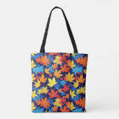 Farbenfrohe Herbstüberreste im dunkelblauen Hinter Tasche (Rückseite)