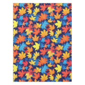 Farbenfrohe Herbstüberreste im dunkelblauen Hinter Tischdecke (Vorderseite)