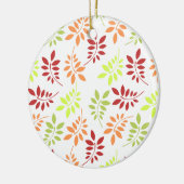 Farbenfrohe Herbstunterschiede in warmen Tönen Keramik Ornament (Links)