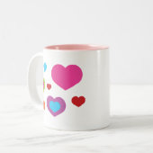 Farbenfrohe Herzen Zweifarbige Tasse (Vorderseite Links)