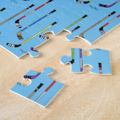Farbenfrohe Hockey Sticks Blue Background Puzzle (Seite)