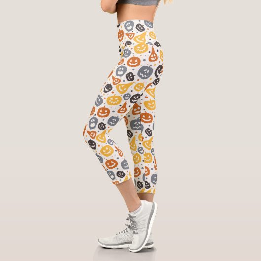 Farbenfrohe Jack-O'-Lantern-Gesichtsmuster Capri Leggings (Links)