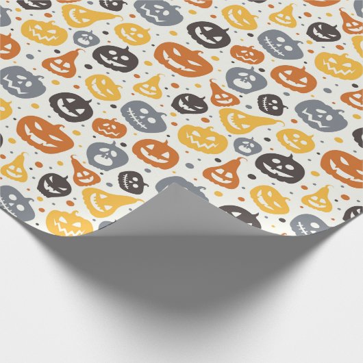 Farbenfrohe Jack-O'-Lantern-Gesichtsmuster Geschenkpapier (Ecke)