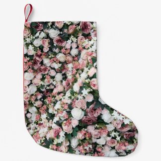 Farbenfrohe künstliche Blume: lebhafter Hintergrun Kleiner Weihnachtsstrumpf