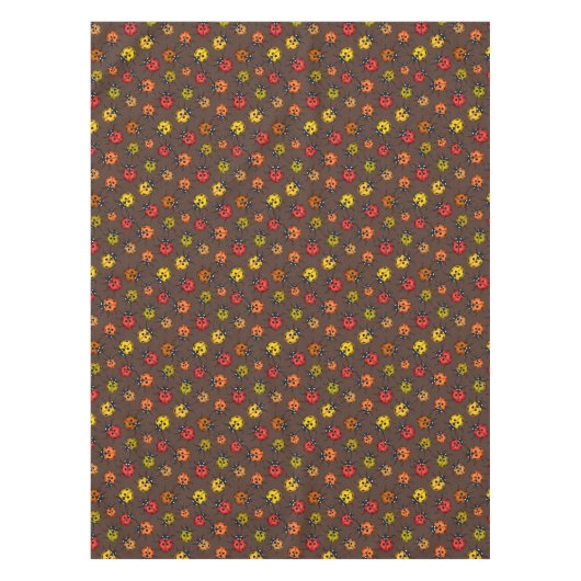 Farbenfrohe Ladybugs auf braun Tischdecke (Vorderseite)