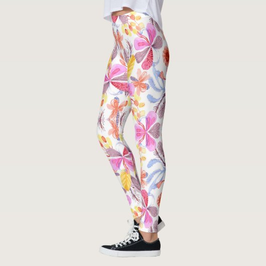Farbenfrohe Leggings mit einem lebendigen Blumenmu (Links)
