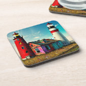 Farbenfrohe Leuchttürme am Strand Getränkeuntersetzer (Linke Seite)