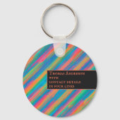 Farbenfrohe Lichtstrahlen fallen in Dunkelheit Schlüsselanhänger (Rückseite)