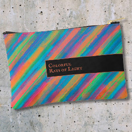 Farbenfrohe Lichtstrahlen fallen in Dunkelheit Zubehörtasche