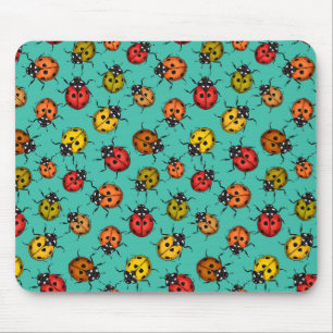 Farbenfrohe Marienkäfer auf Türkis Mousepad