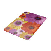 Farbenfrohe Medley von African Daisies Blume Badematte (Schrägansicht)