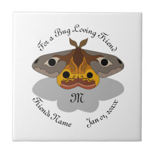 Farbenfrohe Moth Monogram Fliese