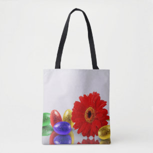 Farbenfrohe Ostereier mit Gerbera Tasche