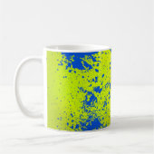 Farbenfrohe Paint-Eimer mit farbigem Spritzer Kaffeetasse (Links)