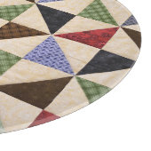 Farbenfrohe Patchwork-Quilt: Blume Textur. Schneidebrett (Ecke)