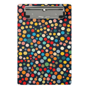 Farbenfrohe Polka Punkte auf dunklem Hintergrund Mini Klemmbrett