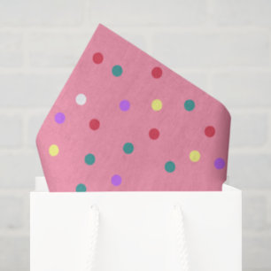 Farbenfrohe Polka Punkte auf Rosa Seidenpapier