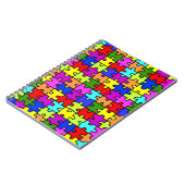 Farbenfrohe Puzzleteile aus Regenbogen Notizblock (Linke Seite)