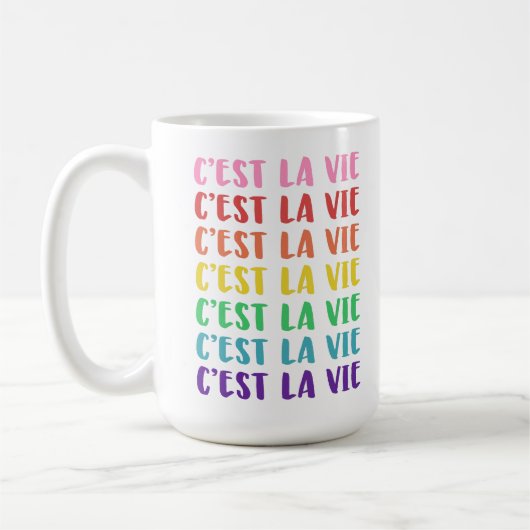 Farbenfrohe Regenbogentypografie French C'est La V Kaffeetasse (Links)