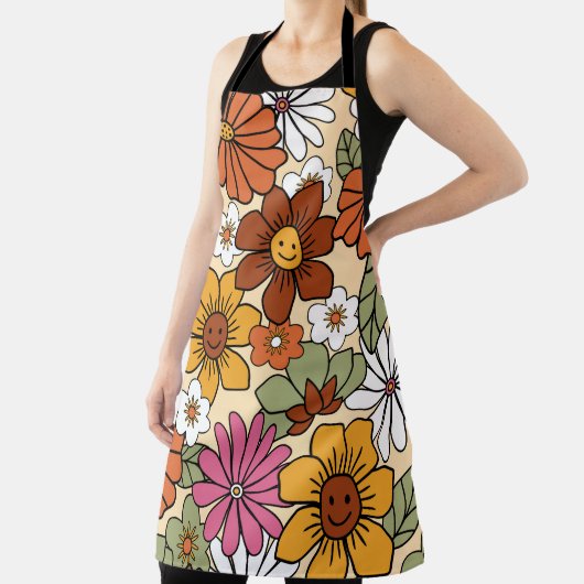 Farbenfrohe Retro-Blumenmuster im 70er-Stil. Vinta Schürze (InSitu)