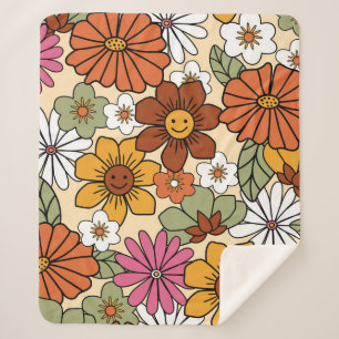 Farbenfrohe Retro-Blumenmuster im 70er-Stil. Vinta Sherpadecke