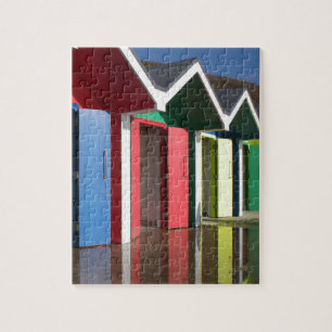 Farbenfrohe, rot-gelbe Hütten Kabinen Puzzle