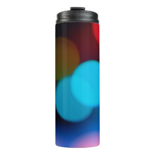 farbenfrohe (rote Himmelskunst und gelbe Farbe) un Thermosbecher